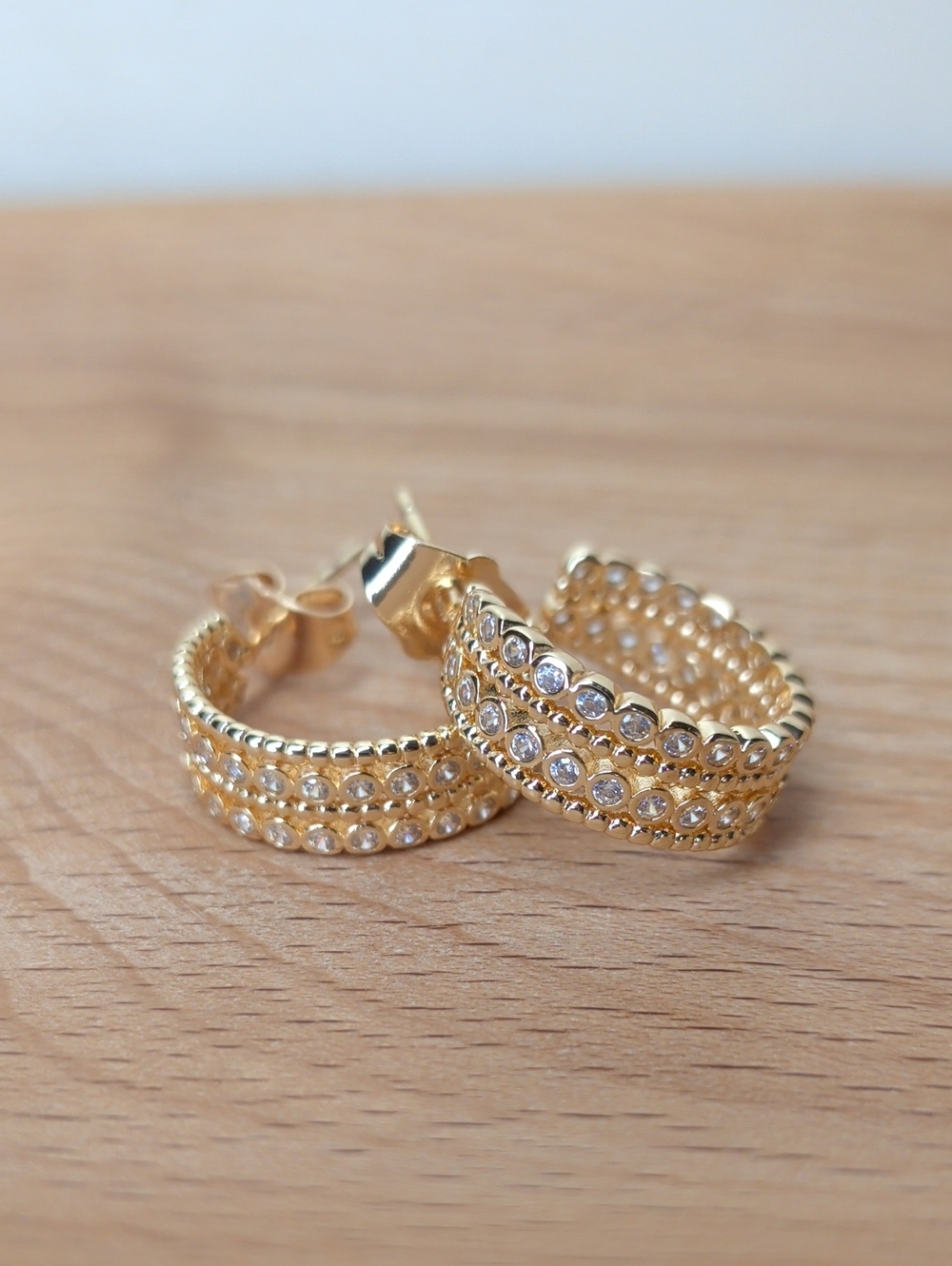 18k Gold Filled Huggie Hoops with bezel set Cubic Zirconias